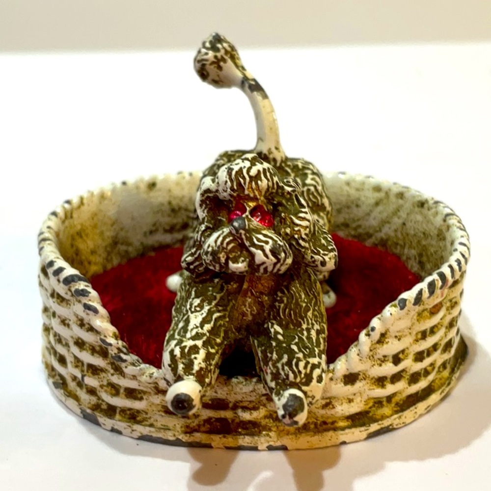 Antique pincushion cast iron poodle in velvet dog bed florenza